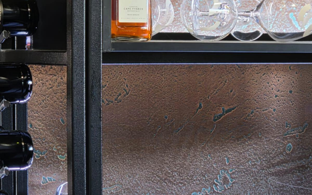 HOMAPAL Copper Moon Turquoise back bar cladding at Dimples Café, Woodmead
