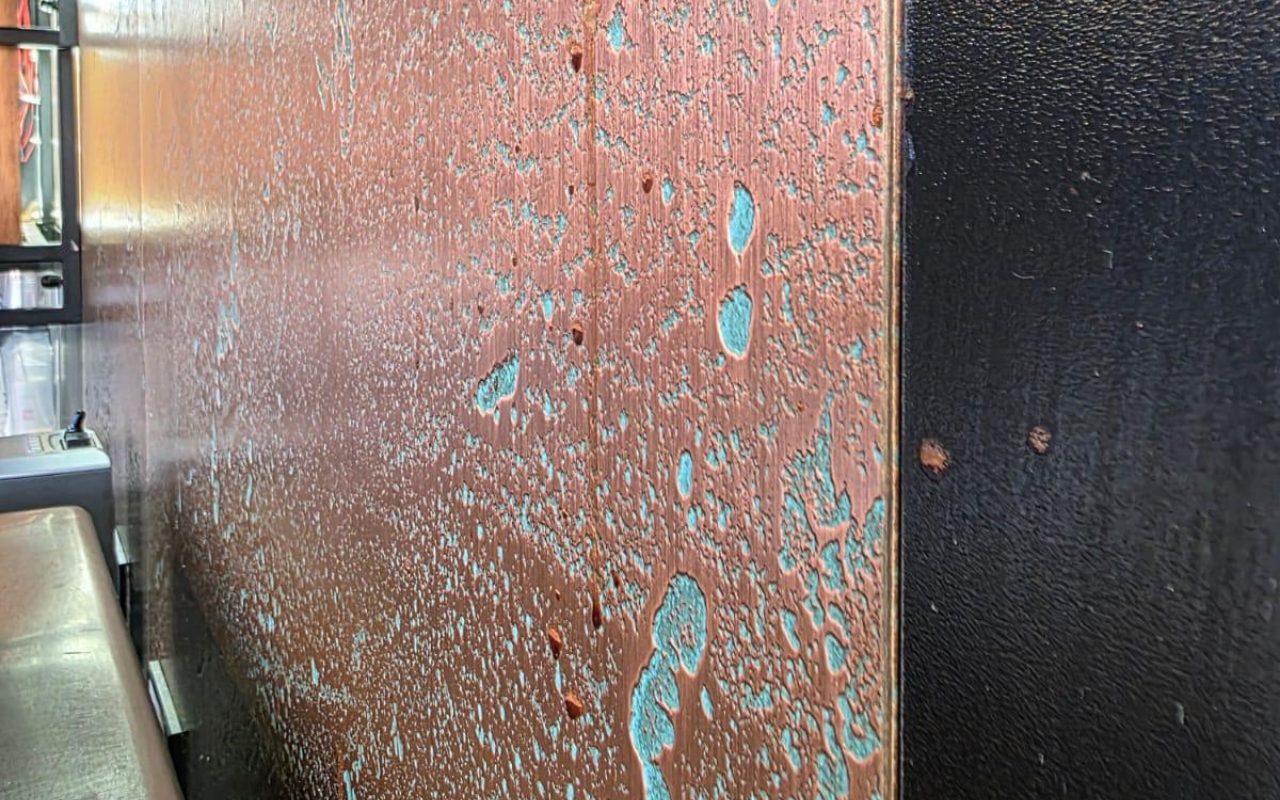 HOMAPAL Copper Moon Turquoise back bar cladding at Dimples Café, Woodmead