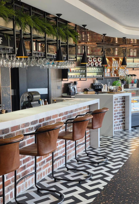 HOMAPAL Copper Moon Turquoise back bar cladding at Dimples Café, Woodmead